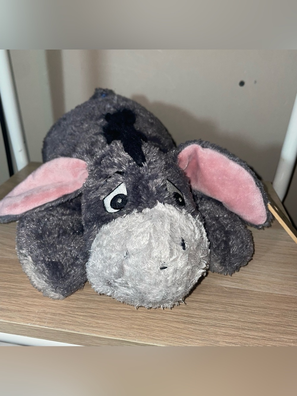 Disney Parks Eeyore Plush with a floppy body and a detachable tail